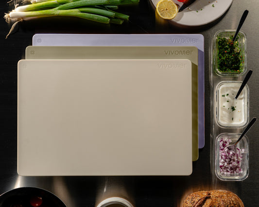 Three Shellworks VIVOMER cutting boards in merino, lilac and meadow